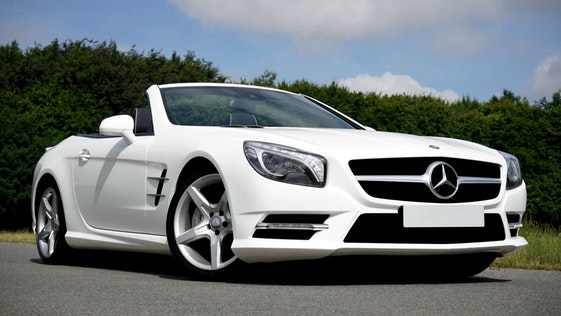 white mercedes benz waiting for auto shipping