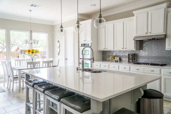 a clean kitchen that movers have set up after moving 